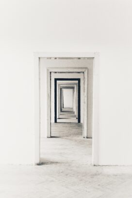 A white room and a series of doors that has a hypnotizing effect. This links to the white room of the afterlife in the story.
