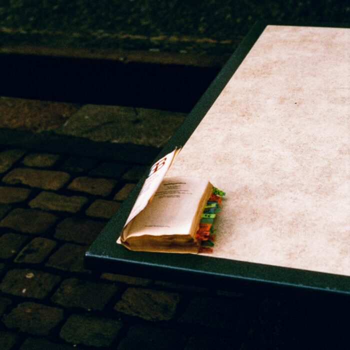 A page crowded with handwritten notes; the printed story is boxed in by someone else’s urgency.